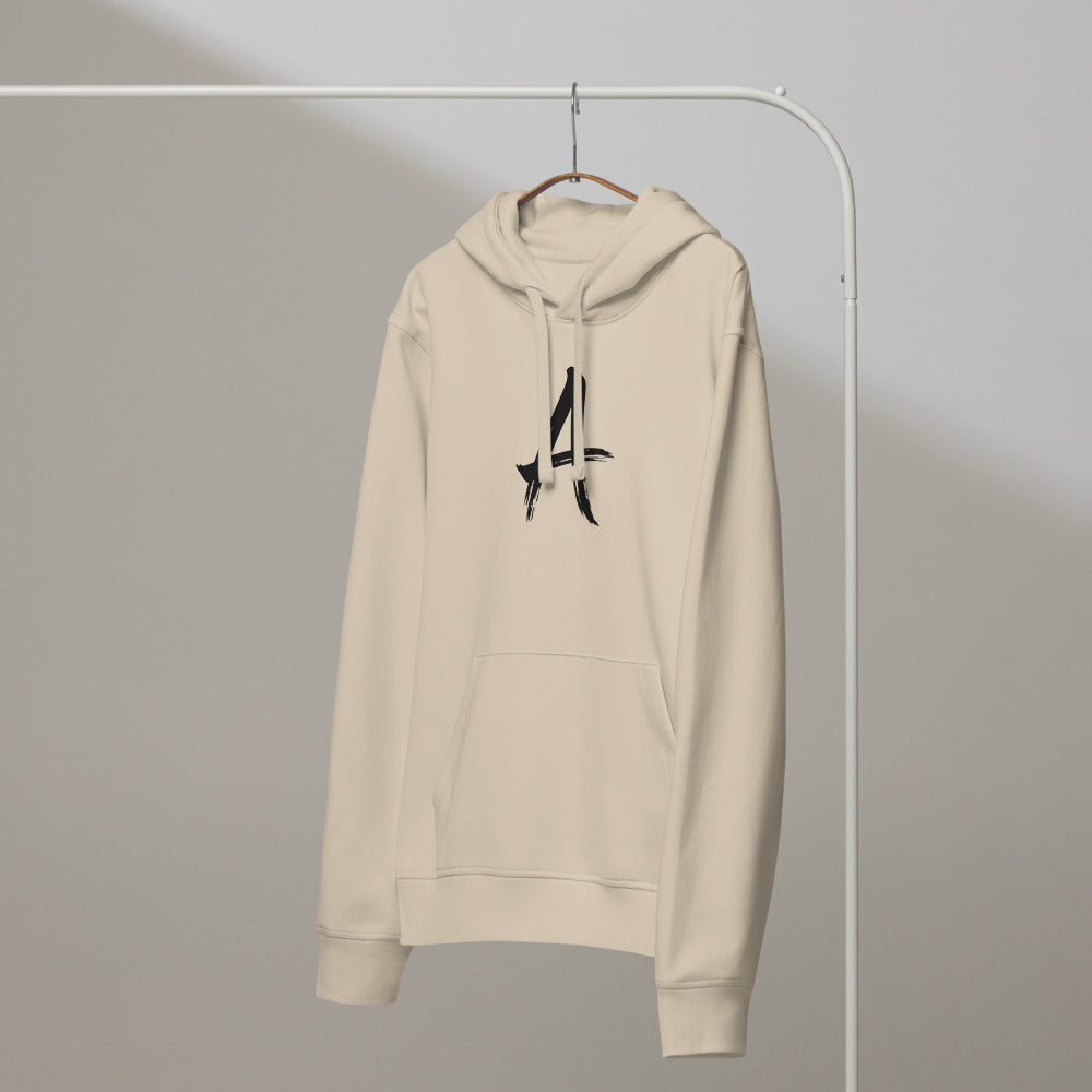 A minimalist sumi-e brush art design of the letter A printed on the chest of a hoodie. On a hanger, Clay colourway.