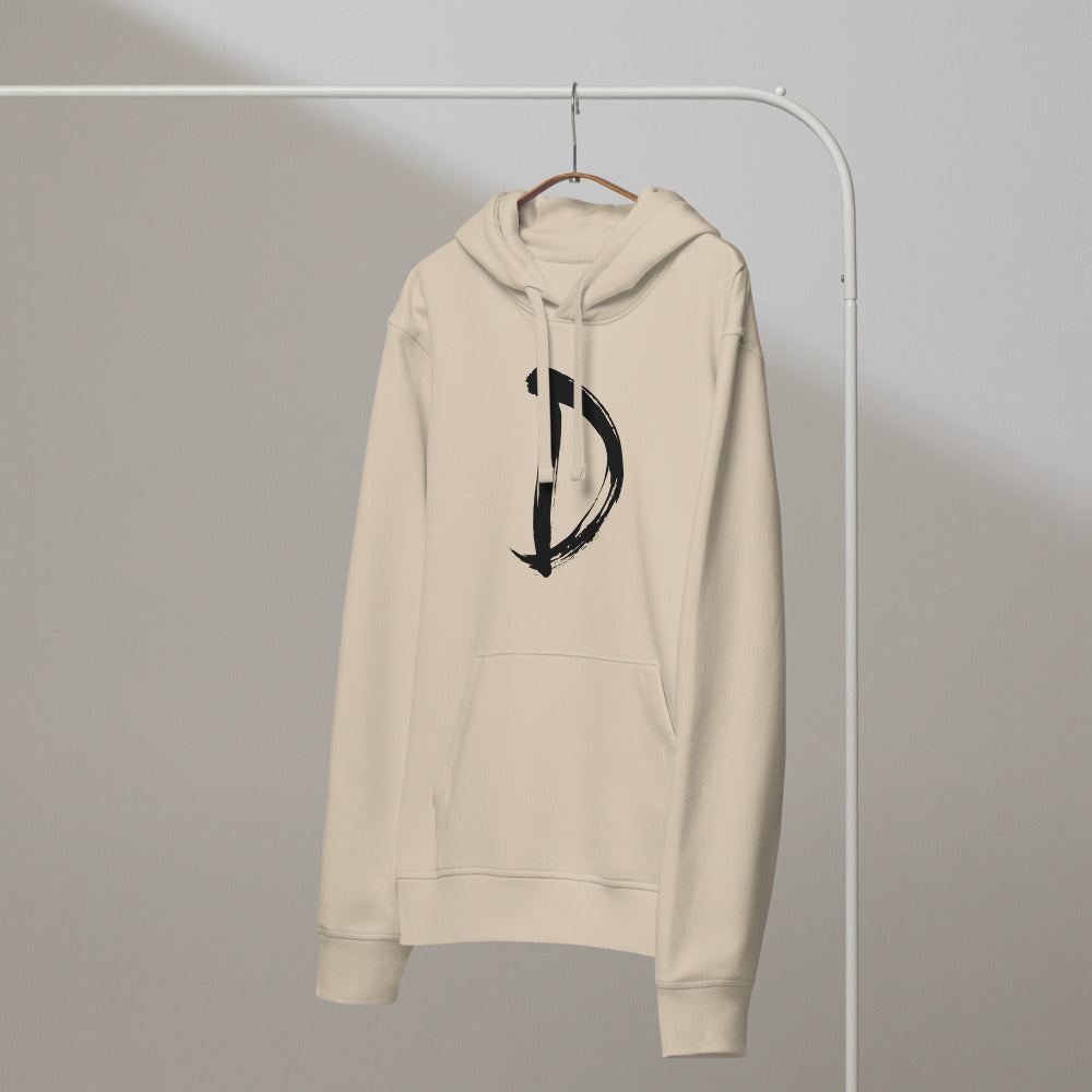 A minimalist sumi-e ink painting of the capital letter D printed on a hoodie. On a hanger, Clay colourway.