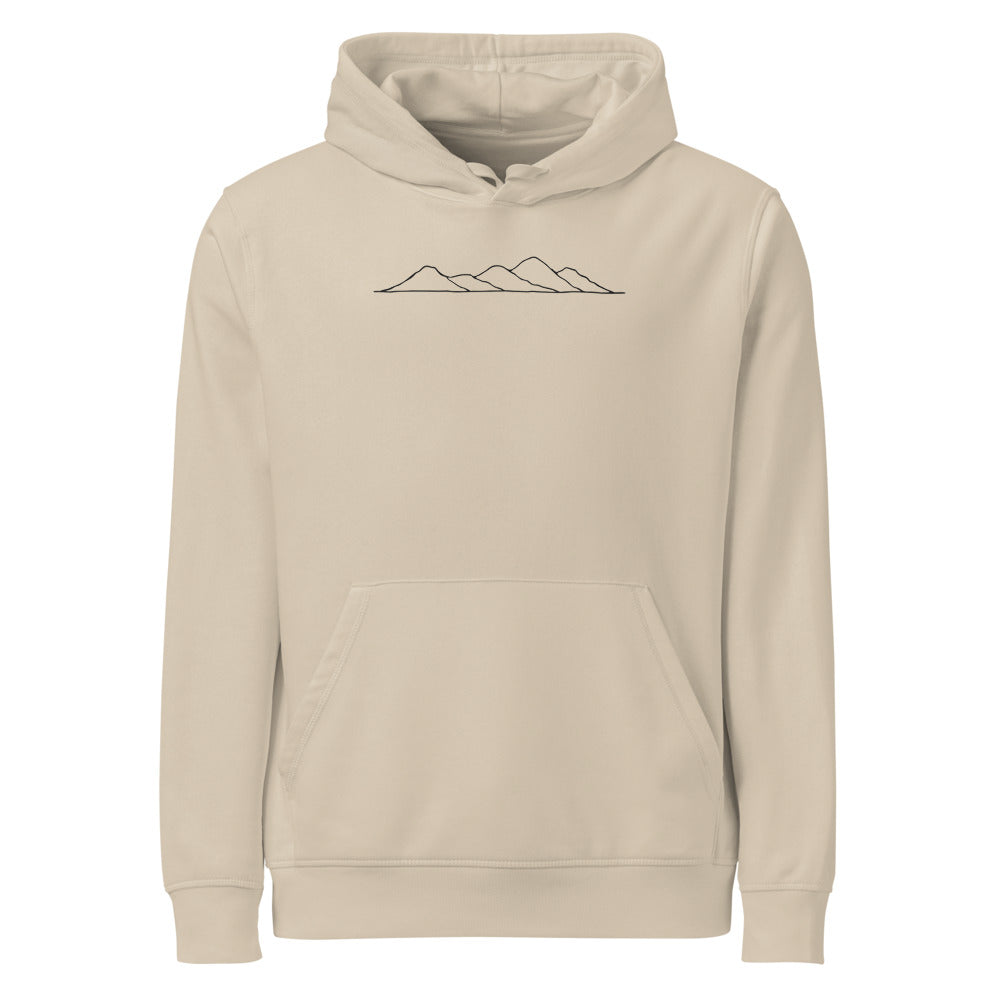 A minimalist topographic line art print showing five rolling hill peaks on a cotton hoodie. Shown on the Clay (Desert Dust) colorway.