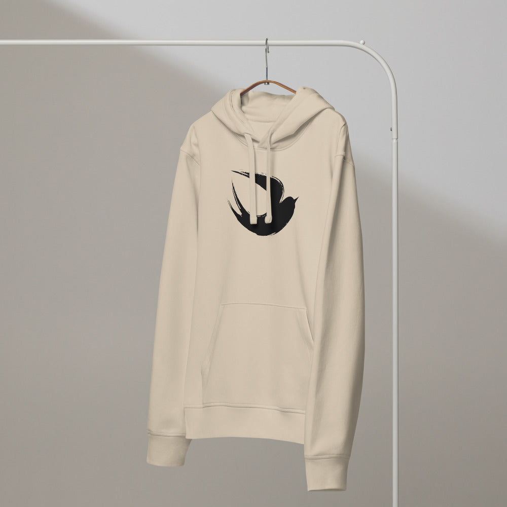 A minimalist sumi-e ink brush painting of a flying swallow on a hoodie. On a hanger, Clay colourway.