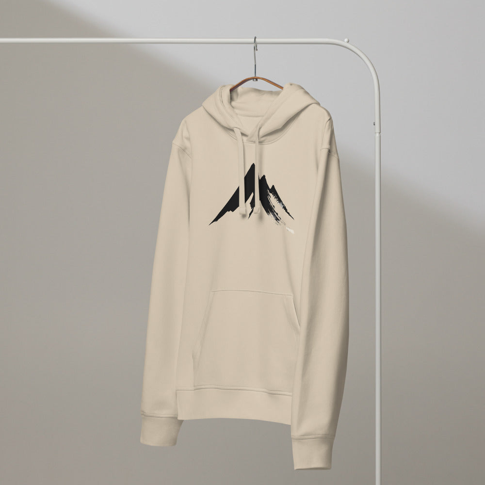 A sharp, minimalist sumi-e ink drawing of a jagged mountain peak printed on a hoodie. On a hanger, Clay colourway.
