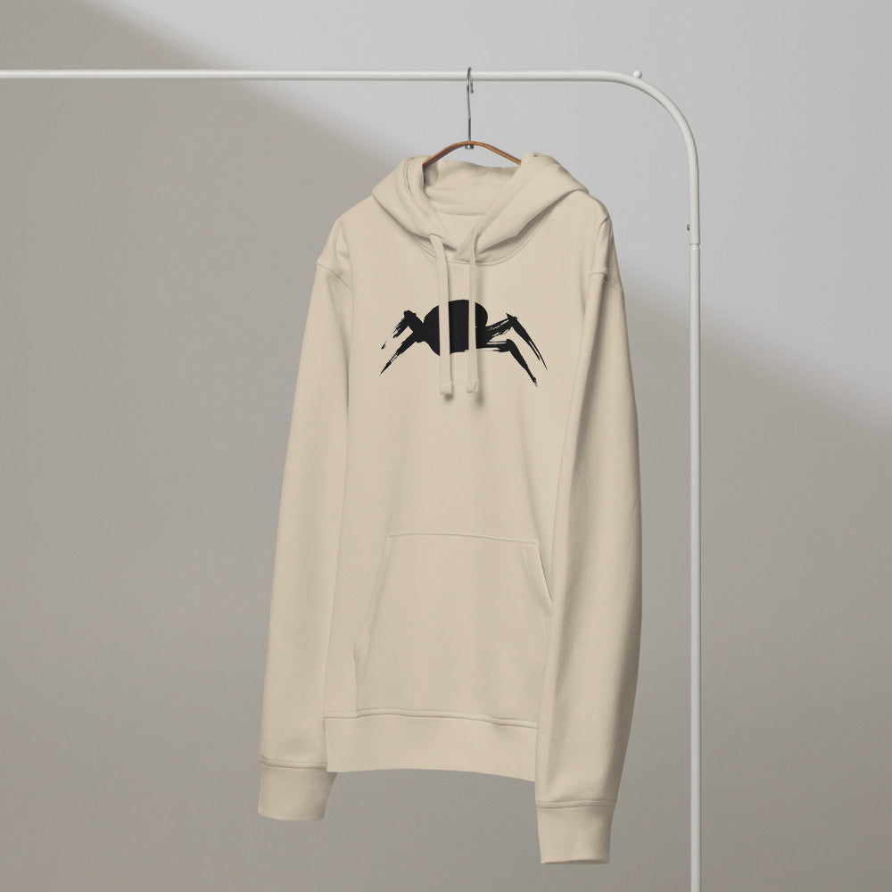 A minimalist sumi-e ink painting of a crab shell and legs printed on a hoodie. On a hanger, Clay colourway.
