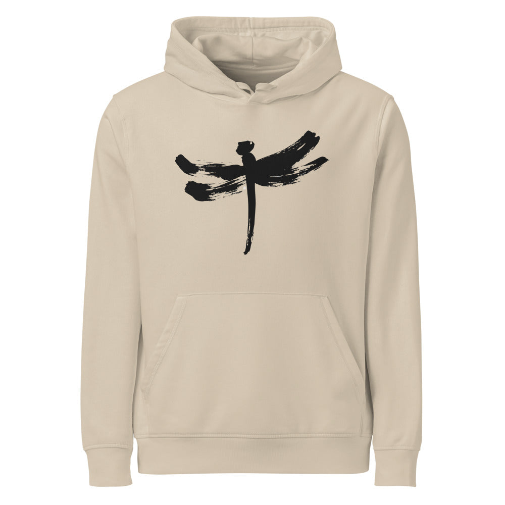 A minimalist dragonfly sumi-e ink design printed on a hoodie. Shown on the Clay (Desert Dust) colorway.
