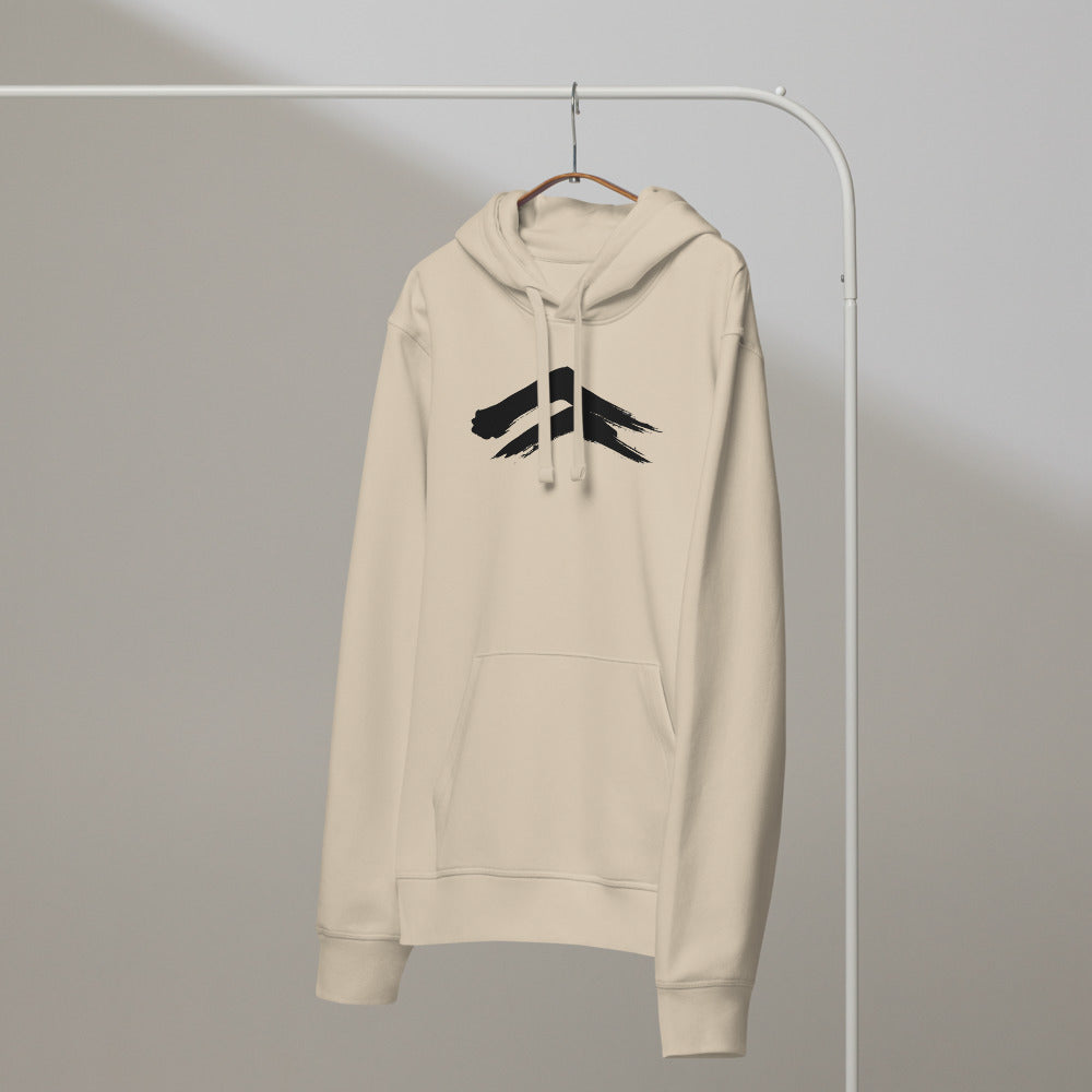 A minimalist sumi-e painting of two dry-brush mountain ridges printed on a hoodie. On a hanger, Clay colourway.
