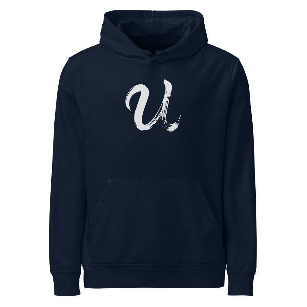 A minimalist black sumi-e ink brushstroke of the capital letter U printed on a hoodie. Shown on the Ink (French Navy) colorway.