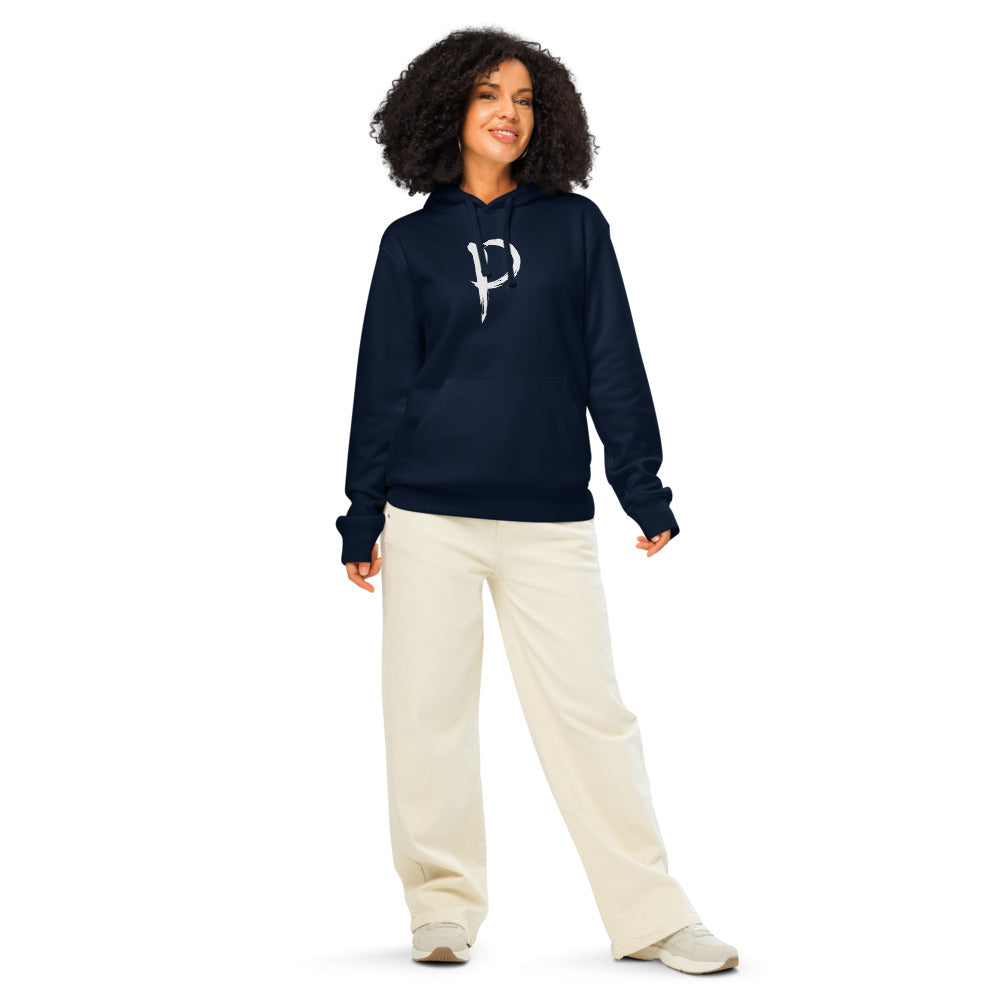The letter P in black sumi-e brush calligraphy printed on a hoodie. Worn by a woman, Ink colourway.