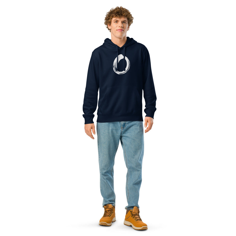 A single black sumi-e brushstroke forming an unclosed letter O on a hoodie. Worn by a man, Ink colourway.