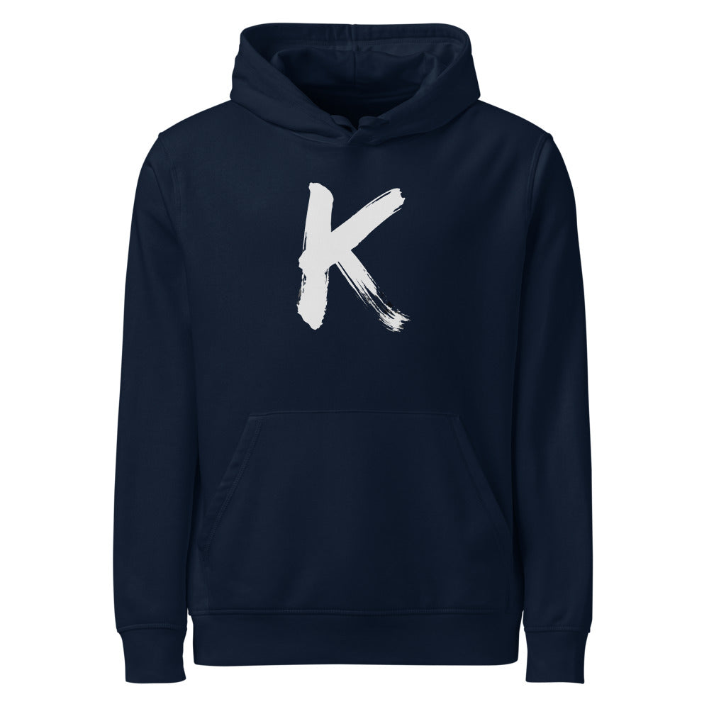 Sumi-e ink brush painting of the capital letter K printed on a hoodie. Shown on the Ink (French Navy) colorway.